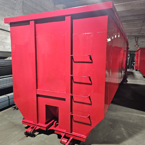 Large 40-yard roll-off dumpster in an industrial area, designed for heavy waste